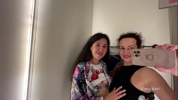 Two horny bitches in the public locker room